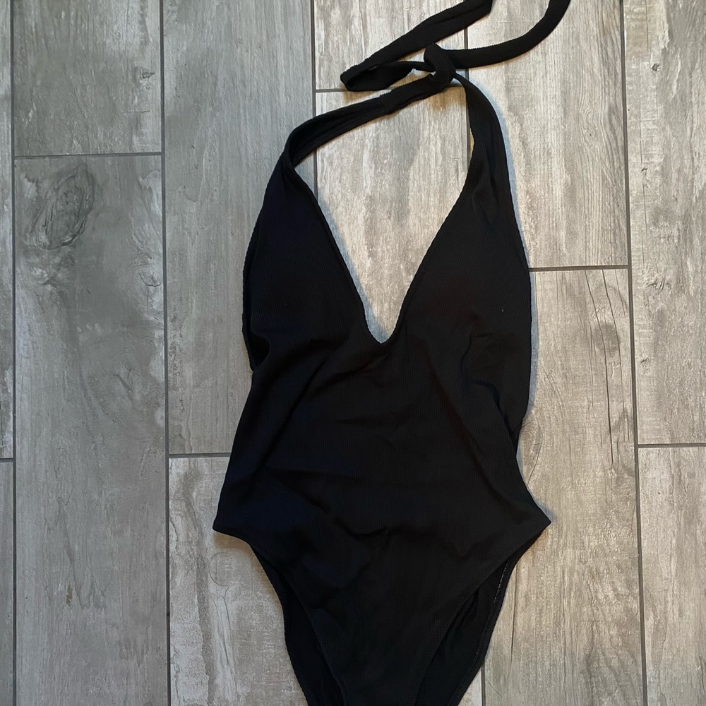 Backless black ribbed one piece bathing suit